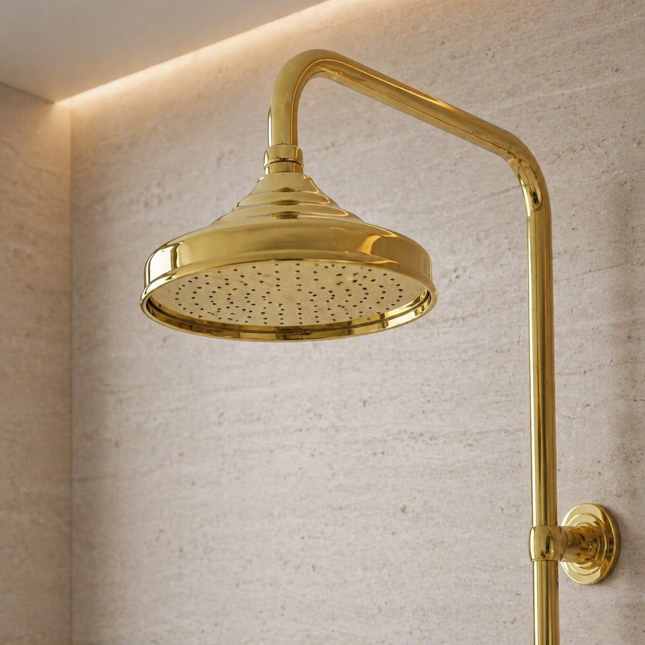 Handcrafted unlacquered antique brass exposed shower system featuring rainfall shower head, handheld shower, cross handles, and integrated tub faucet in a luxury modern bathroom