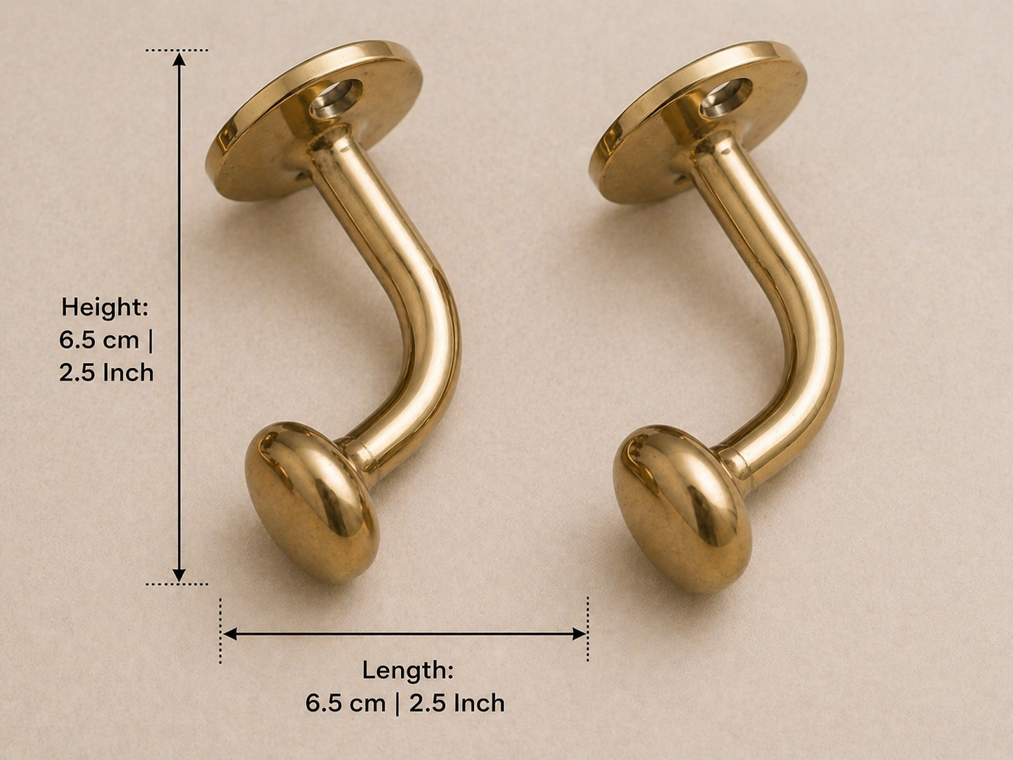 Two curved barbell-style body jewelry pieces with round ball ends and round flat backs, shown on a light beige background with overlaid dimension arrows and text indicating 6.5 cm (2.