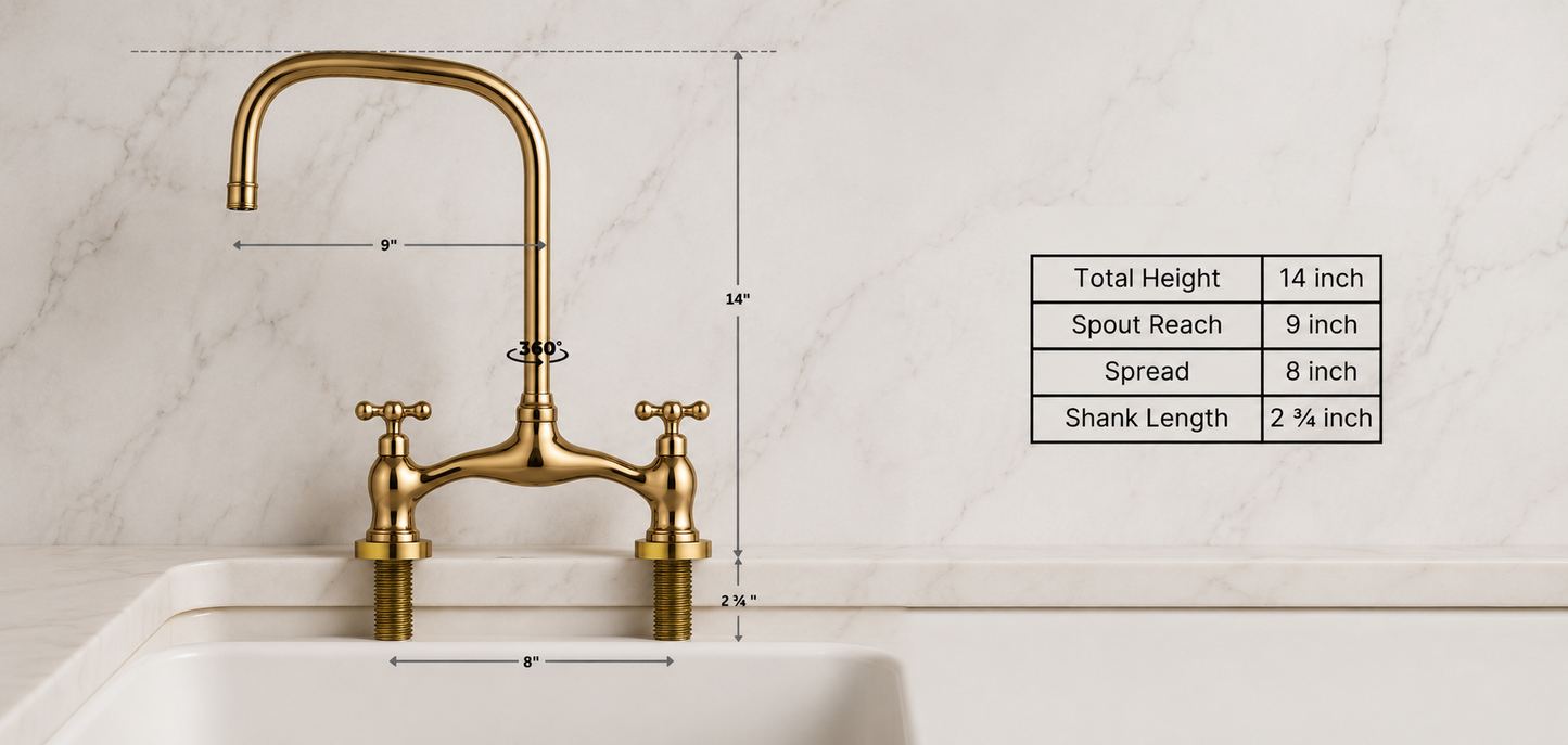 Gold bridge faucet with two cross handles installed above a white sink, shown with dimension callouts and a specification table on a light marble backsplash.