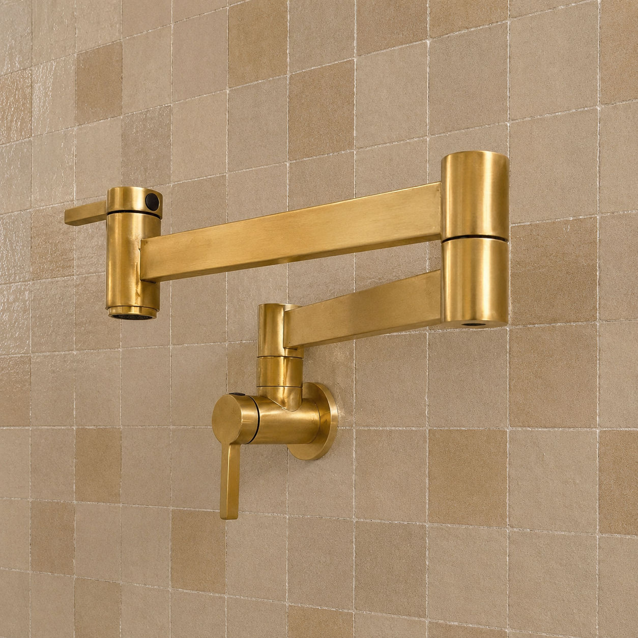 Modern handmade unlacquered solid brass wall-mounted pot filler faucet with dual swing arms and minimalist design for luxury kitchens.