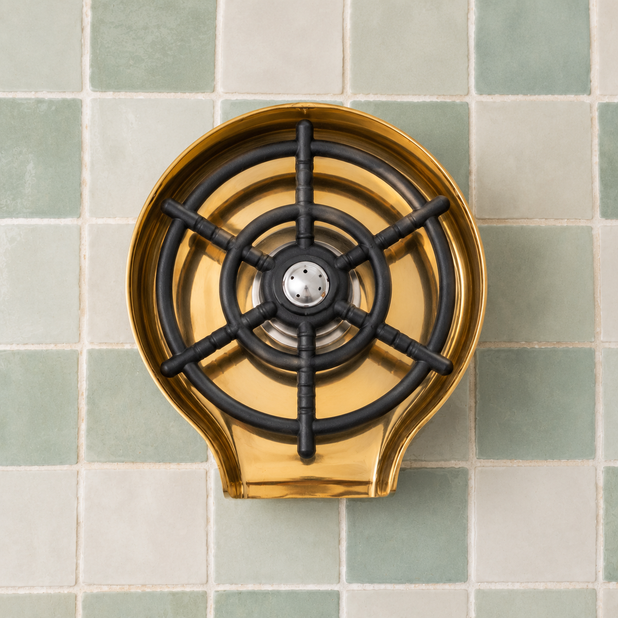 Handmade solid brass glass rinser with unlacquered finish installed for rinsing cups, bottles, mugs, and drinkware.
