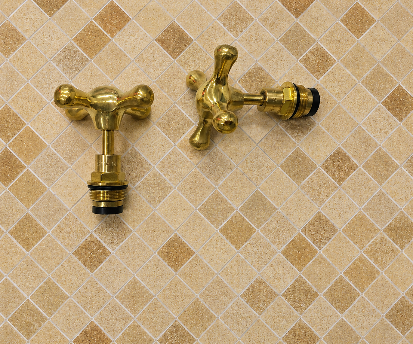 Handmade solid unlacquered brass cross faucet handle set for 1/2-inch bathroom and kitchen faucets.