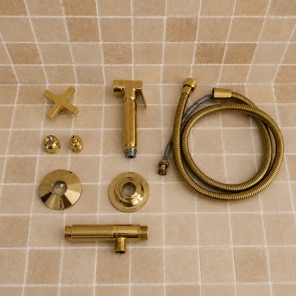Handmade solid brass kitchen side sprayer with unlacquered finish and shut-off handle installed beside a kitchen faucet.