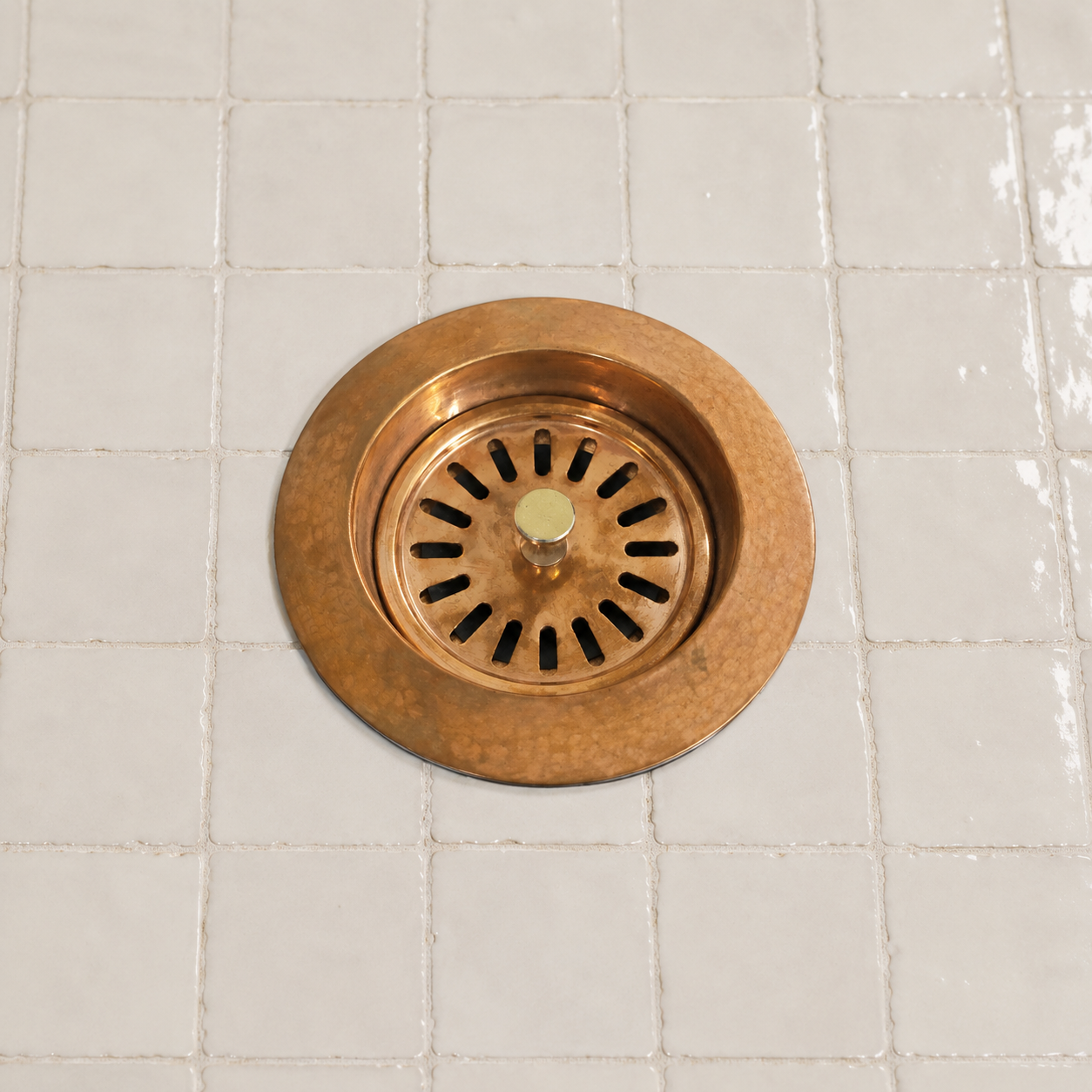 Handmade solid copper kitchen sink strainer basket drain assembly with removable basket for farmhouse and copper kitchen sinks.
