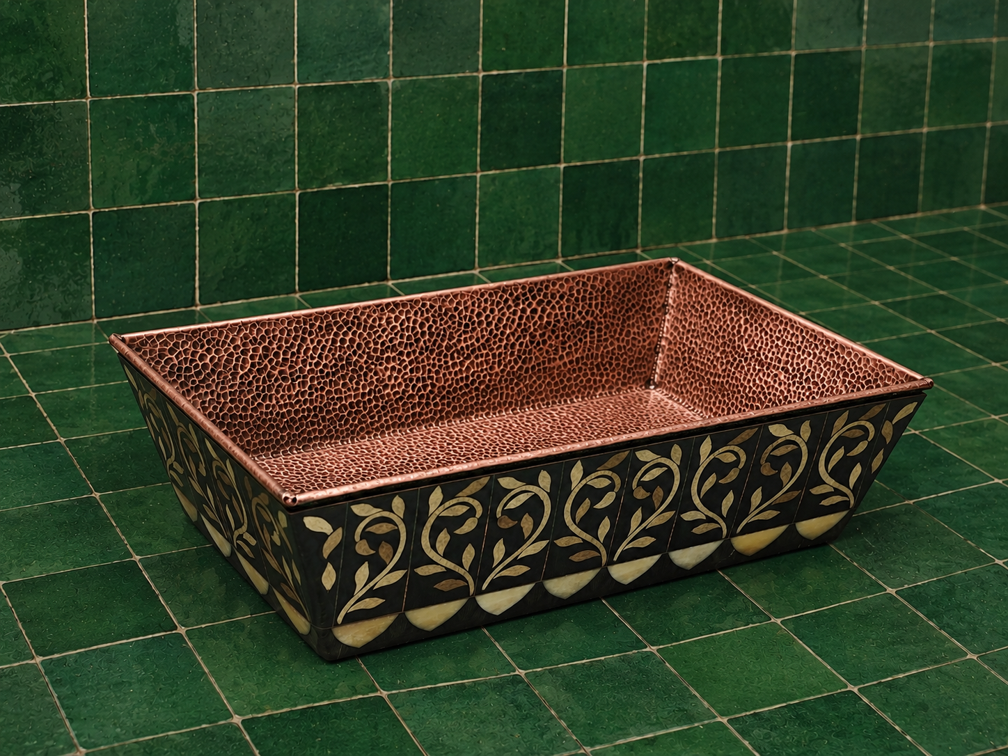 Rectangular Moroccan copper bathroom vessel sink with hammered interior and decorative floral inlay exterior