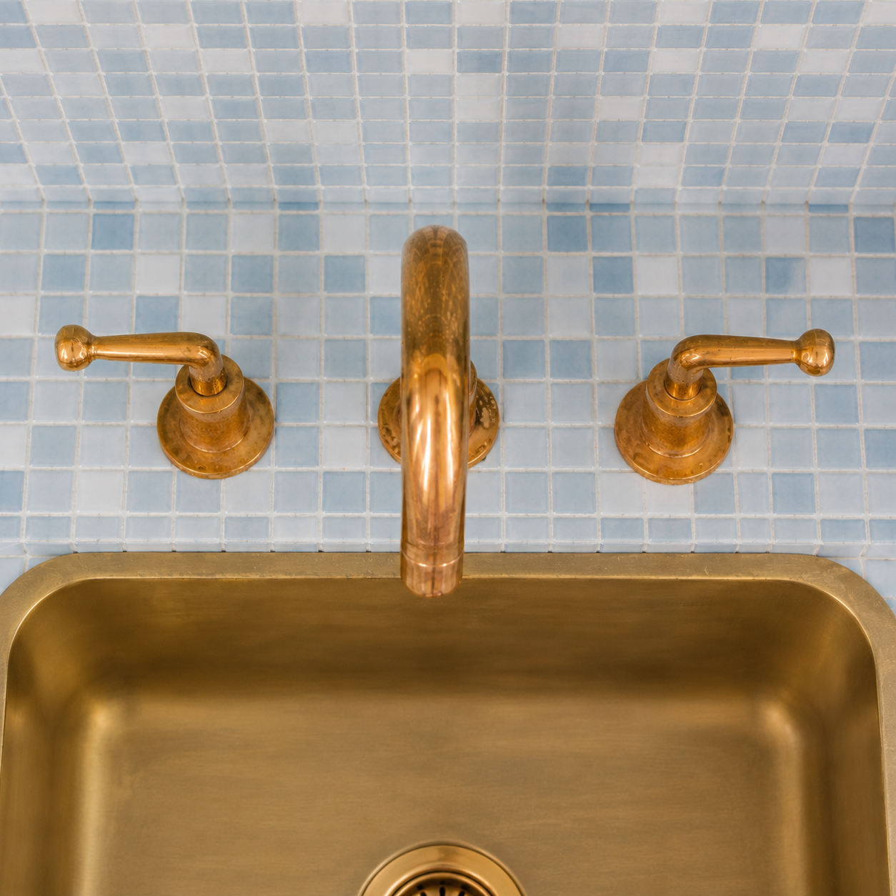 Top view of solid brass widespread bathroom faucet with two lever handles